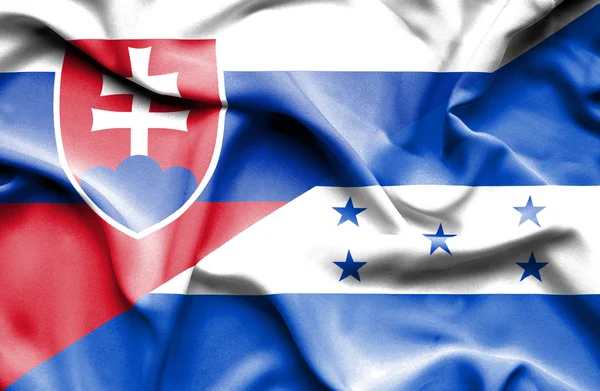 Viftande flagga honduras och Slovakien — Stockfoto