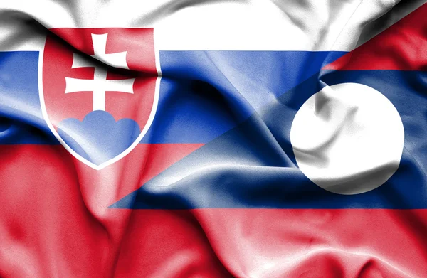 Viftande flagga laos och Slovakien — Stockfoto