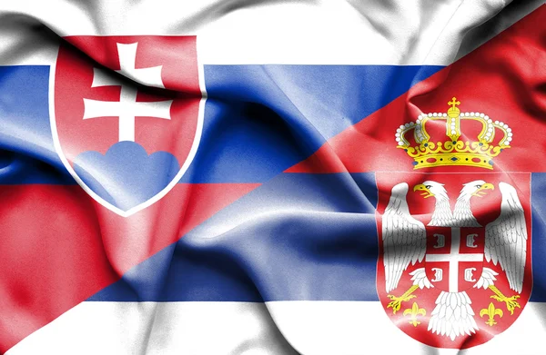 セルビア、スロバキアの旗を振っています。 — ストック写真
