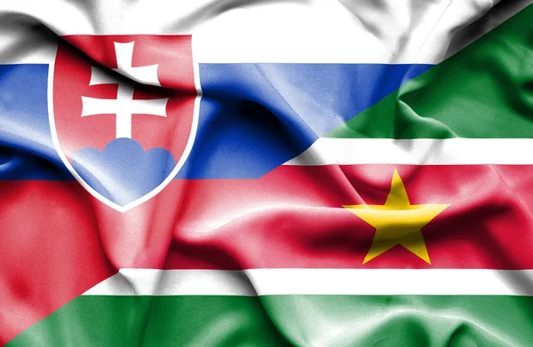 Viftande flagga Surinam och Slovakien — Stockfoto