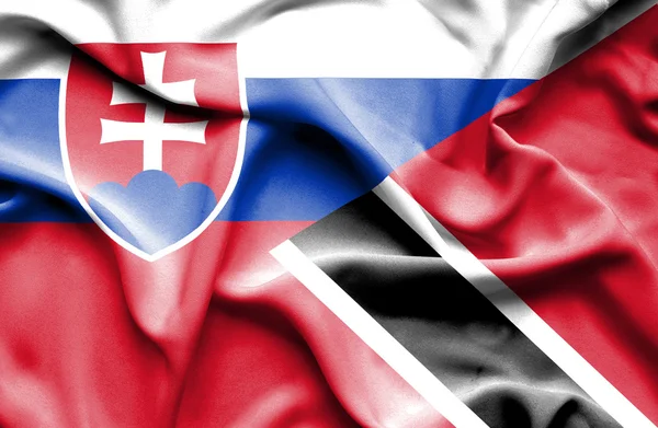 Trinidad och tobago och Slovakien viftande flagga — Stockfoto