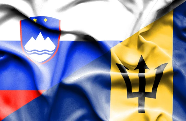 Waving flag of Barbados and Slovenia — Stock Photo, Image