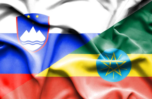 Waving flag of Ethiopia and Slovenia — Stock Photo, Image