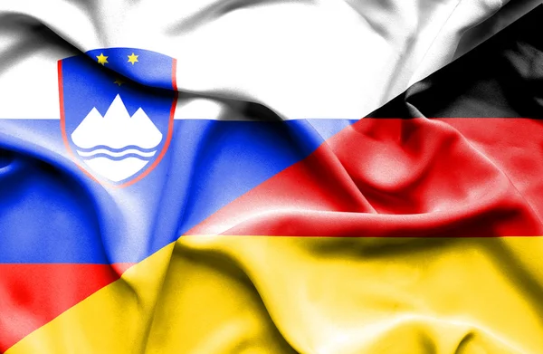 Bandera ondeante de Alemania y Eslovenia —  Fotos de Stock