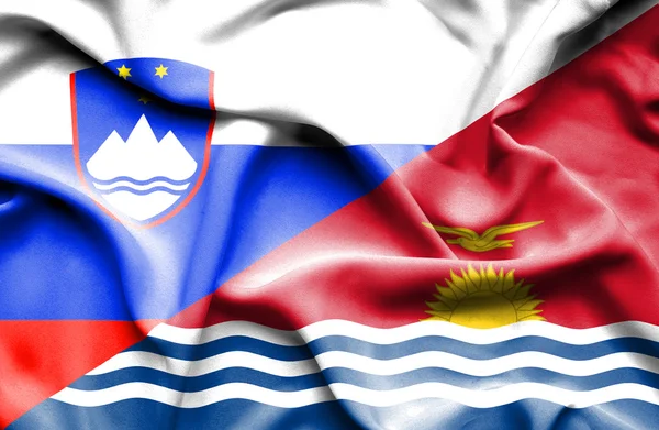 Waving flag of Kiribati and Slovenia — Stock Photo, Image