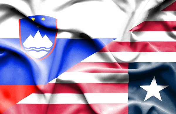 Waving flag of Liberia and Slovenia — Stock Photo, Image