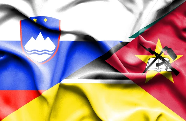 Waving flag of Mozambique and Slovenia — Stock Photo, Image