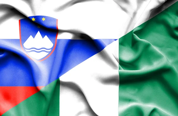 Bandiera sventolante di Nigeria e Slovenia — Foto Stock