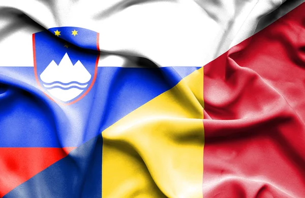 Bandera ondeante de Rumanía y Eslovenia —  Fotos de Stock