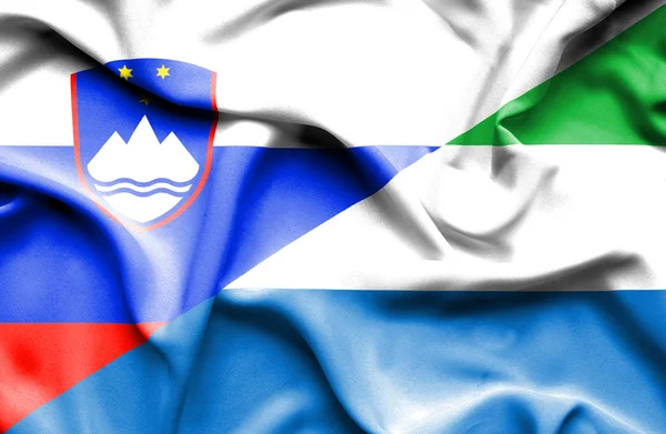Bandeira ondulada de Serra Leoa e Eslovénia — Fotografia de Stock