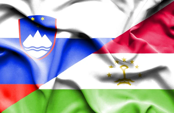 Bandera ondeante de Tayikistán y Eslovenia — Foto de Stock