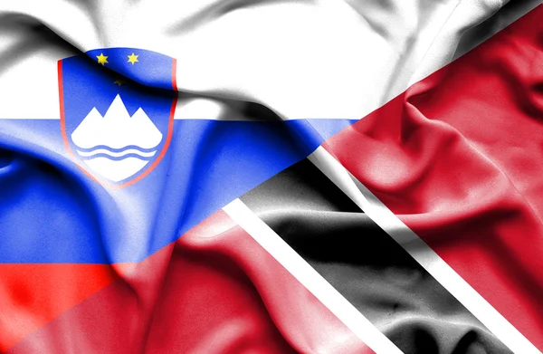 Waving flag of Trinidad and Tobago and Slovenia — Stock Photo, Image