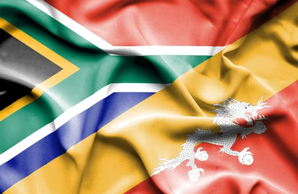 ブータン、南アフリカ共和国の旗を振っています。 — ストック写真