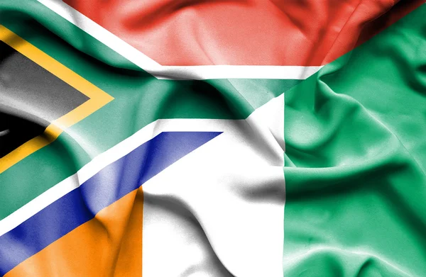 Waving flag of Ivory Coast and South Africa — Stock Photo, Image