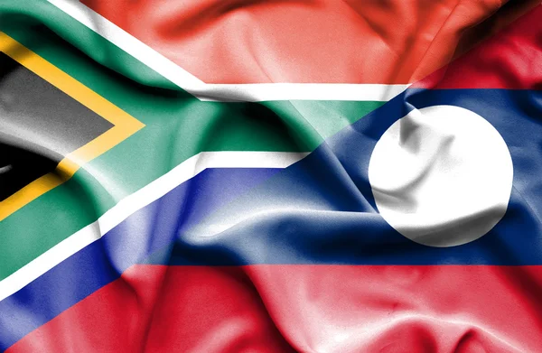 Viftande flagga laos och Sydafrika — Stockfoto