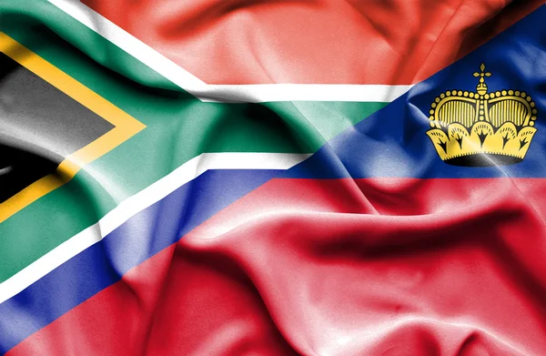Wapperende vlag van lichtenstein en Zuid-Afrika — Stockfoto