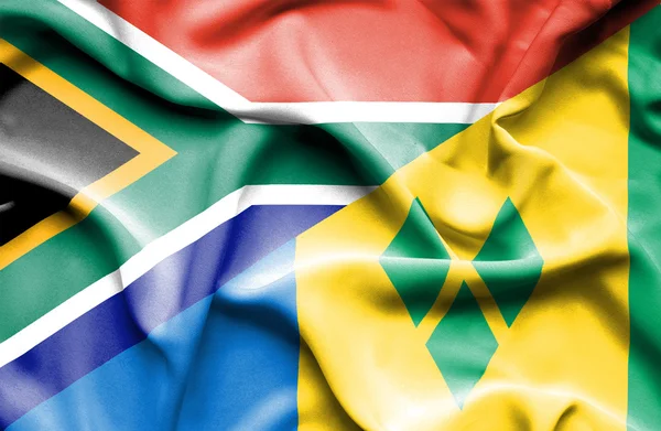 Waving flag of Saint Vincent and Grenadines and South Africa — Stock Photo, Image