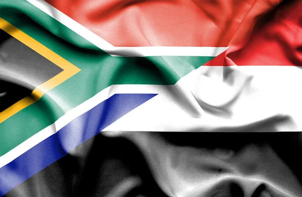 Waving flag of Yemen and South Africa — Stock Photo, Image