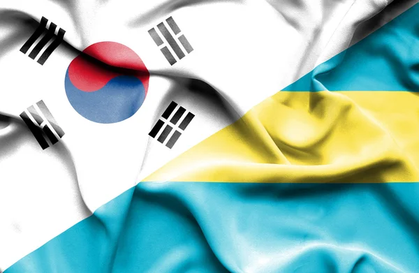 バハマと韓国の旗を振っています。 — ストック写真