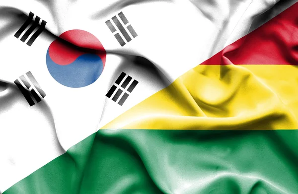 Bandiera sventolante di Bolivia e Corea del Sud — Foto Stock