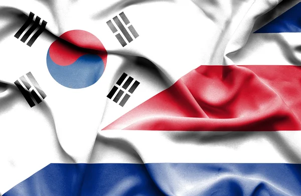 Waving flag of Costa Rica and South Korea — Stock Photo, Image