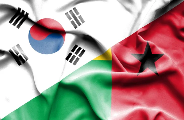 Bandiera sventolante della Guinea Bissau e della Corea del Sud — Foto Stock
