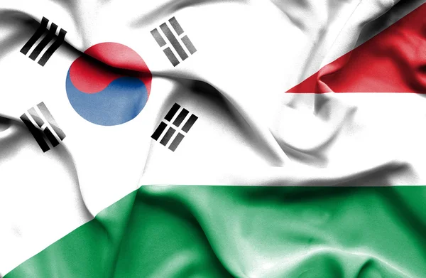Bandiera sventolante di Ungheria e Corea del Sud — Foto Stock