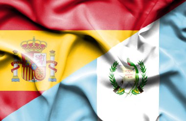 İspanya ve guatemala bayrağı sallayarak