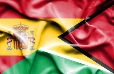 guyana ve İspanya bayrağı sallayarak