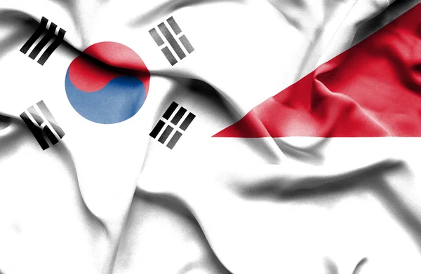 Waving flag of Monaco and South Korea — Stock Photo, Image