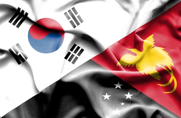 Waving flag of Papua New Guinea and South Korea — Stock Photo, Image