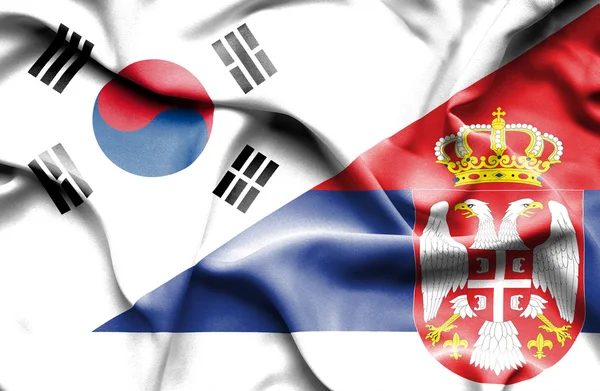 塞尔维亚和韩国那飘扬的旗帜 — 图库照片