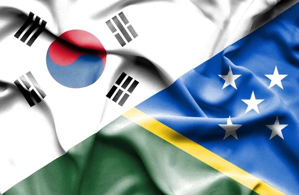 Waving flag of Solomon Islands and South Korea — Stock Photo, Image