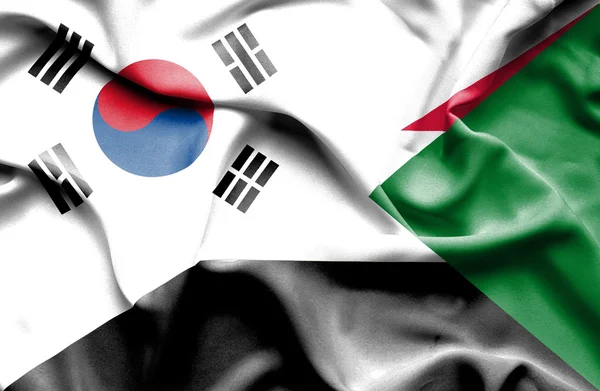 Ondeando la bandera de Sudán y Corea del Sur — Foto de Stock