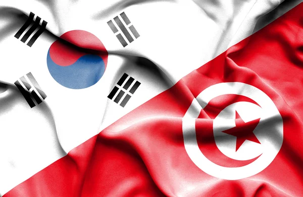 Bandiera sventolante di Tunisia e Corea del Sud — Foto Stock