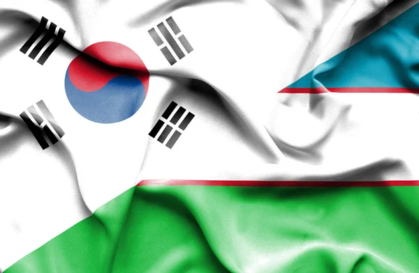 Bandiera sventolante di Uzbekistan e Corea del Sud — Foto Stock