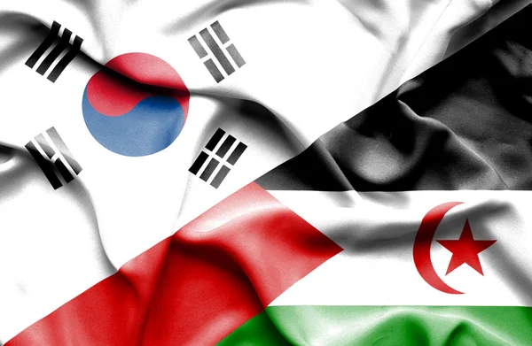 Macha flagą sahara Zachodnia i Południowa korea — Zdjęcie stockowe
