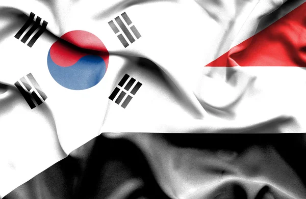 Waving flag of Yemen and South Korea — Stock Photo, Image