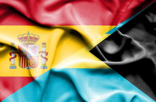 Waving flag of Bahamas and Spain — Stock Photo, Image