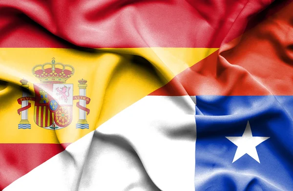 Waving flag of Chile and Spain — Stock Photo, Image