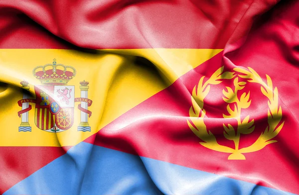 Waving flag of Eritrea and Spain — Stock Photo, Image