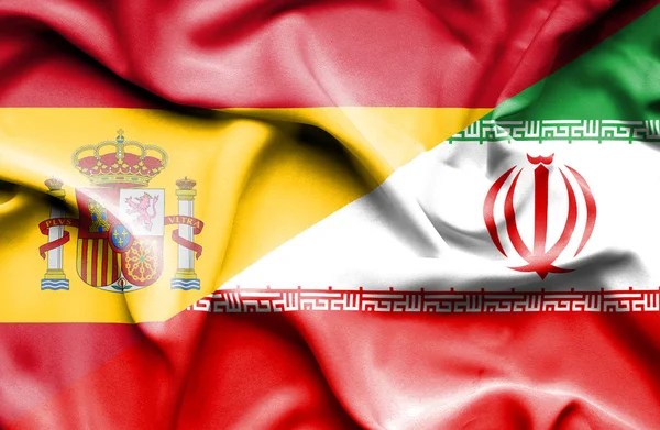 Flagge von Iran und Spanien schwenkend — Stockfoto