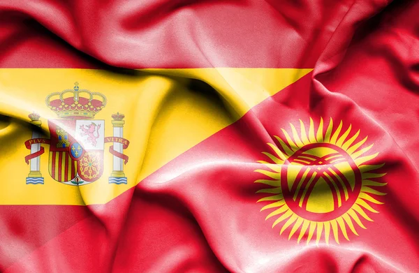 Κουνώντας τη σημαία της Κιργιζίας και Ισπανία — Φωτογραφία Αρχείου