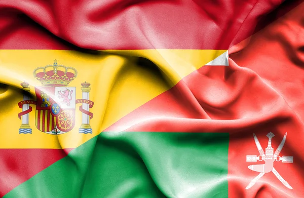 Κουνώντας τη σημαία του Ομάν και Ισπανία — Φωτογραφία Αρχείου