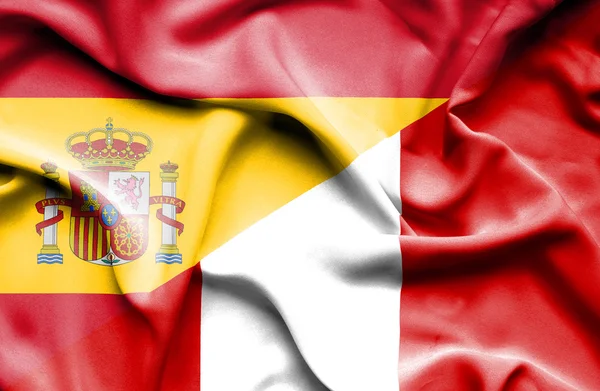 Peru ve İspanya bayrağı sallayarak — Stok fotoğraf