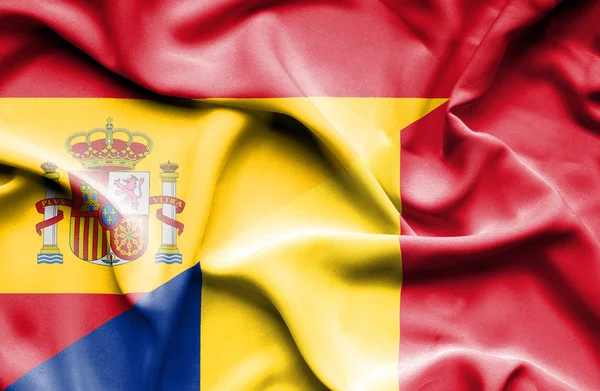 Waving flag of Romania and Spain — Stock Photo, Image