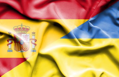 Ukrayna ve İspanya bayrağı sallayarak