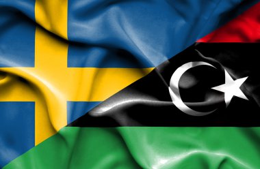 libya ve İsveç bayrağı sallayarak