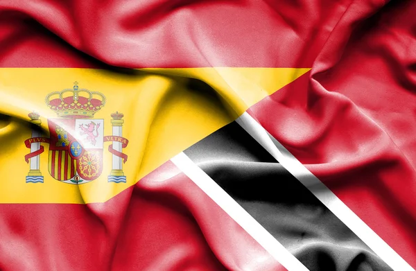 Mávání vlajkou Trinidadu a Tobaga a Španělsko — Stock fotografie