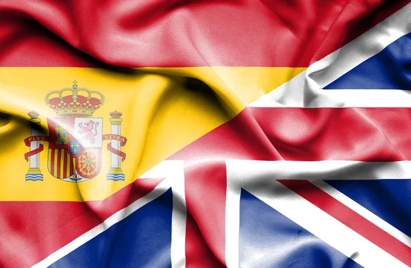 Sventolando bandiera di Regno Unito e Spagna — Foto Stock
